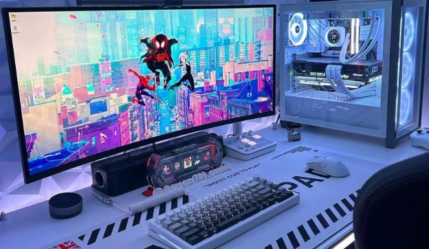 gaming setup with prebuilt pc monitor keyboard wireless mouse and white mousepad
